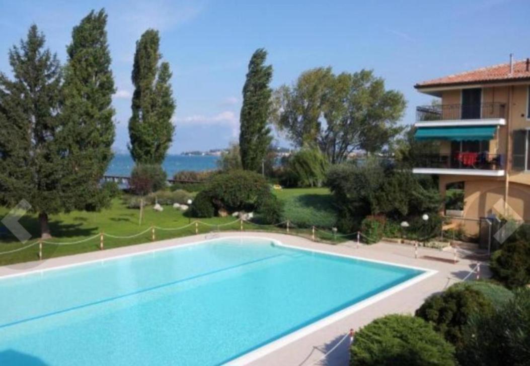 Ena Apt Fronte Lago Bilocale Con Piscina Parco E Pontile Privato Apartment